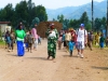Josh walking with villagers