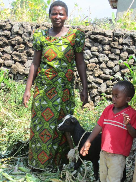 Woman and child with donated goat